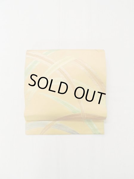 画像2: L0707B 名古屋帯 女性用着物 シルク（正絹）  淡い 橙色 芝草 【中古】 【USED】 【リサイクル】 ★★★☆☆ (2)